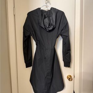 Nike Women's Utility Long Rain  Jacket in Black